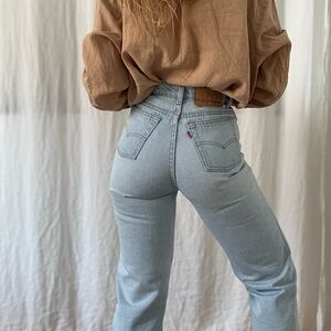 Vintage Levi’s 501 jeans high waisted light wash tapered leg made in Canada